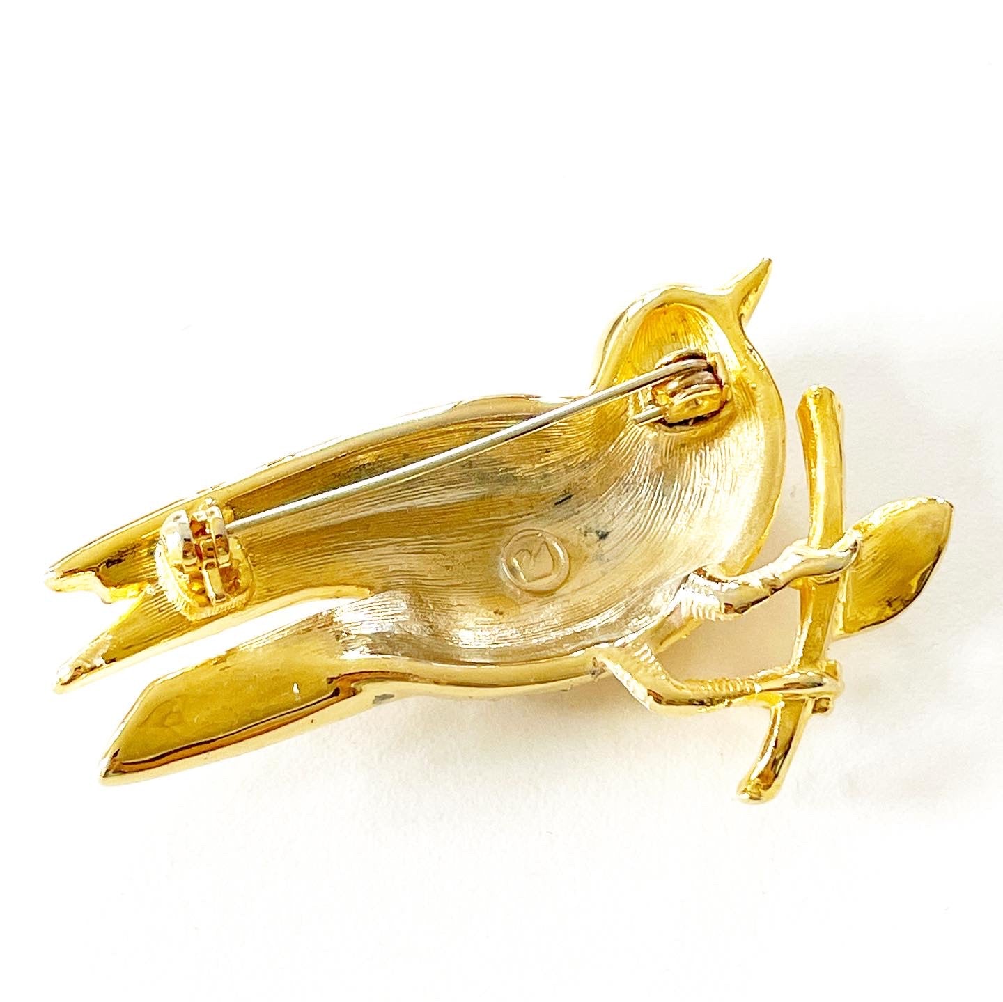 Vintage Swarovski signed swan logo pave crystal bird brooch accented with rudy/sapphire cabochon eye