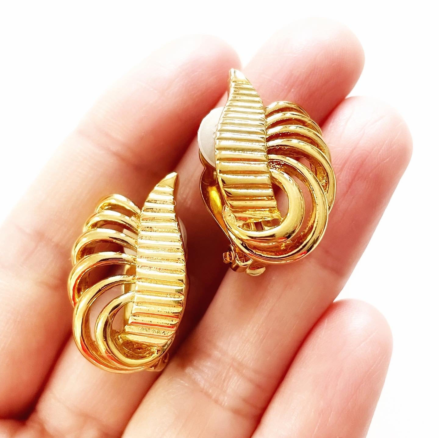 Vintage D’ORLAN signed 22-karat gold plated swirl shape clip earrings